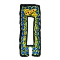 Ruff tombstone with artificial flowers